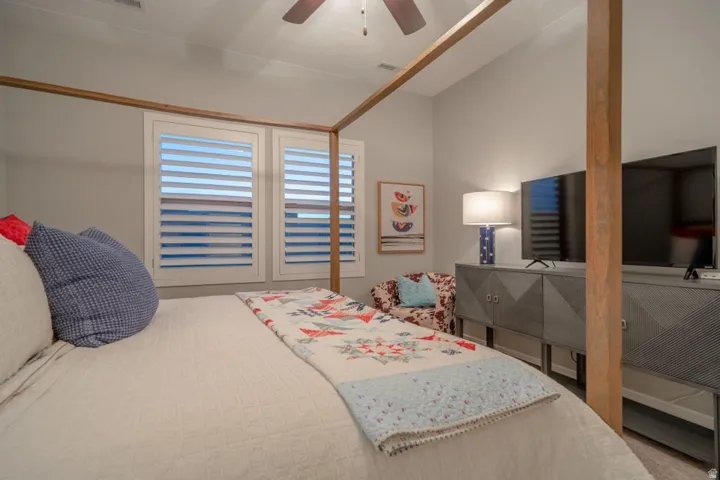 Bedroom featuring ceiling fan