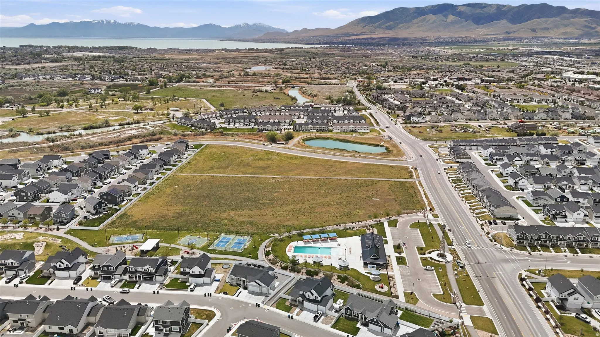 Aerial perspective showcasing a developing residential area with diverse housing styles