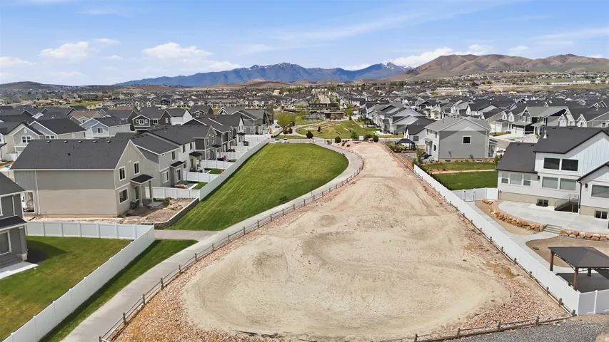 Expansive land parcel with surrounding residential development