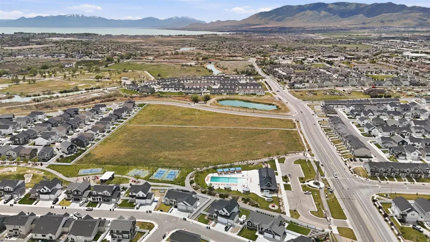 Aerial perspective showcasing a developing residential area with diverse housing styles