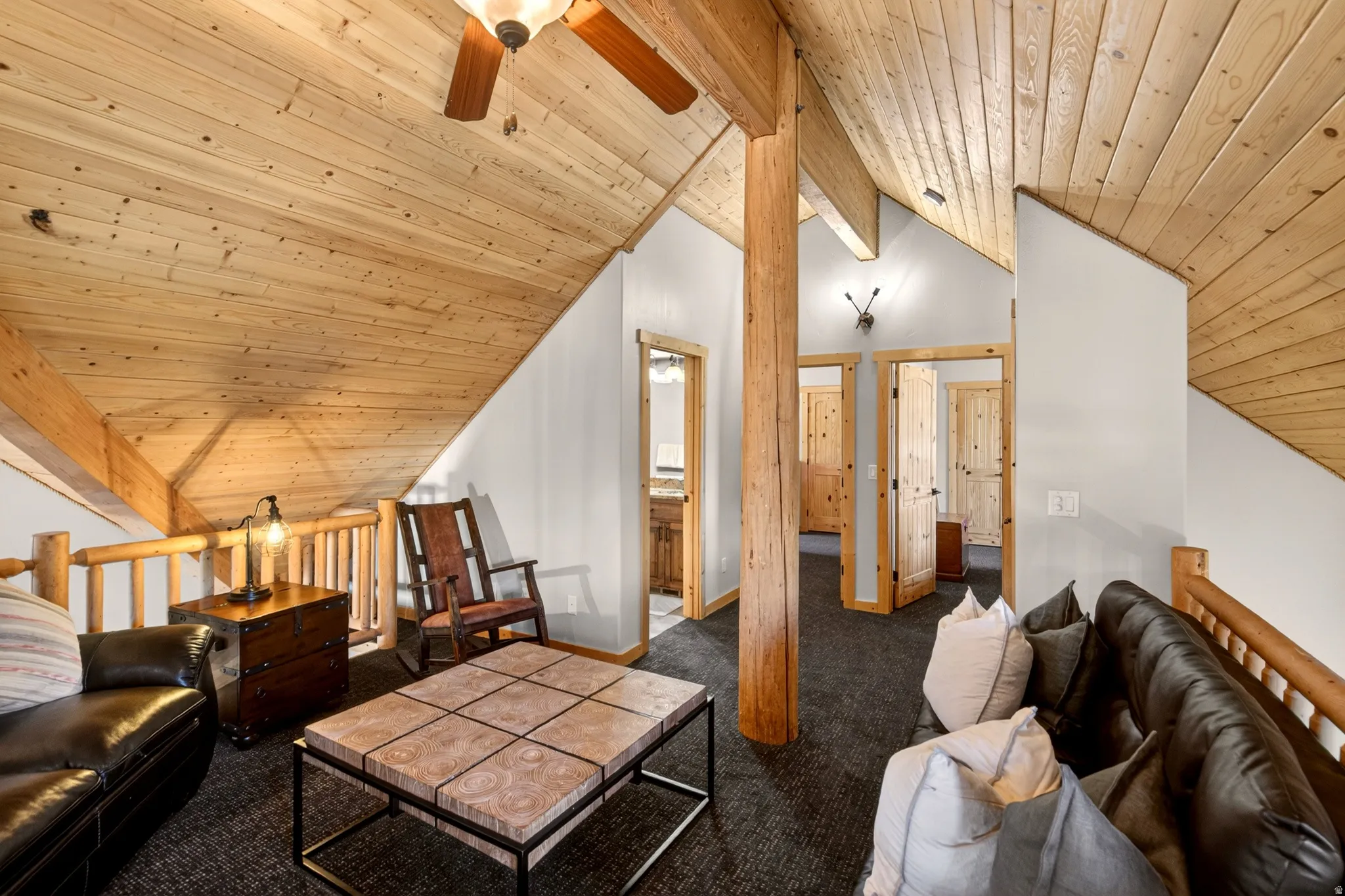 Vaulted wood-paneled ceiling with exposed beams