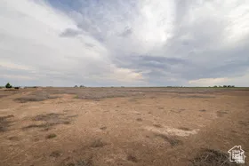 Expansive undeveloped land featuring a broad, flat terrain