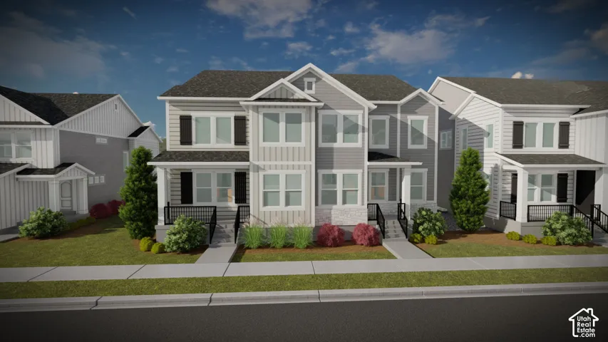 Contemporary townhome-style residences featuring multi-level facades, gabled roofs, and varied siding textures