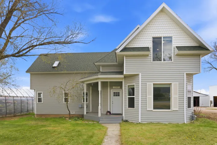 Light gray siding exterior with white trim