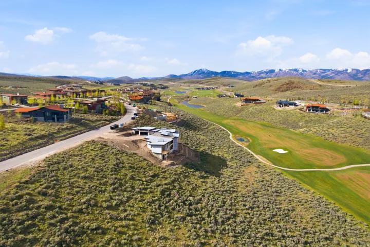 Modern architectural homes situated within a natural landscape