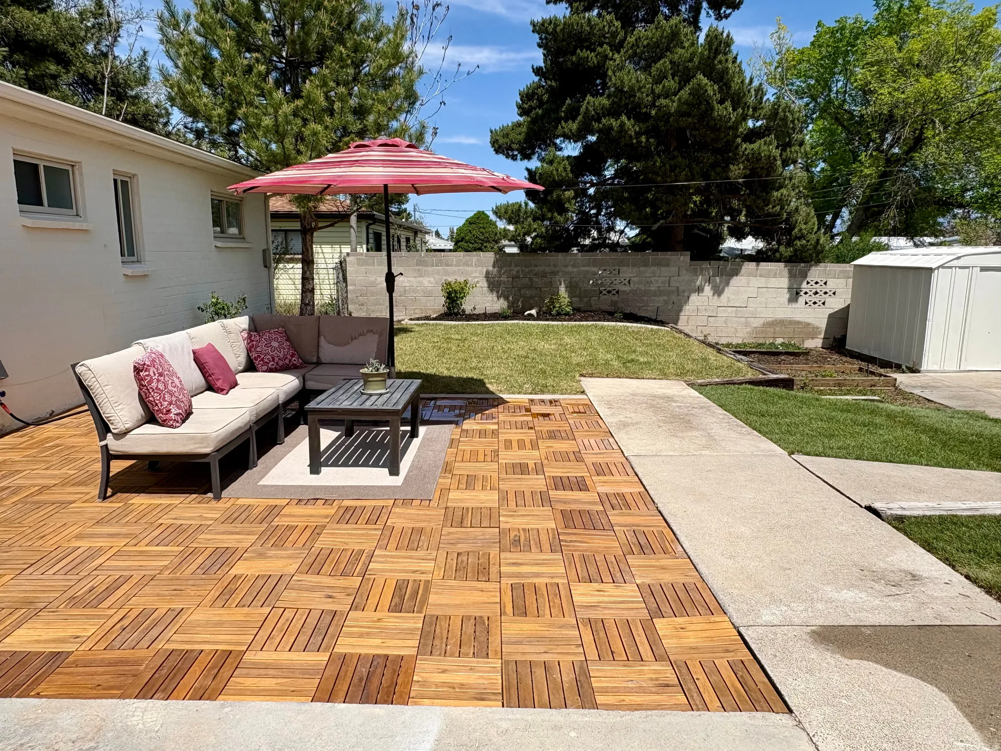 Outdoor patio featuring wood-finish tile flooring