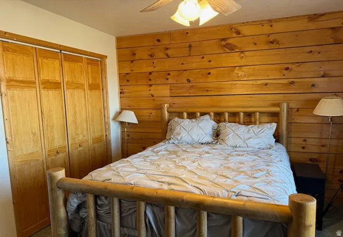 Wood-paneled accent wall featuring light-toned wood