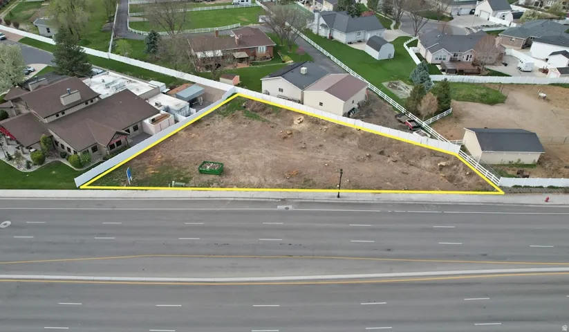 Cleared lot with defined boundaries and street frontage