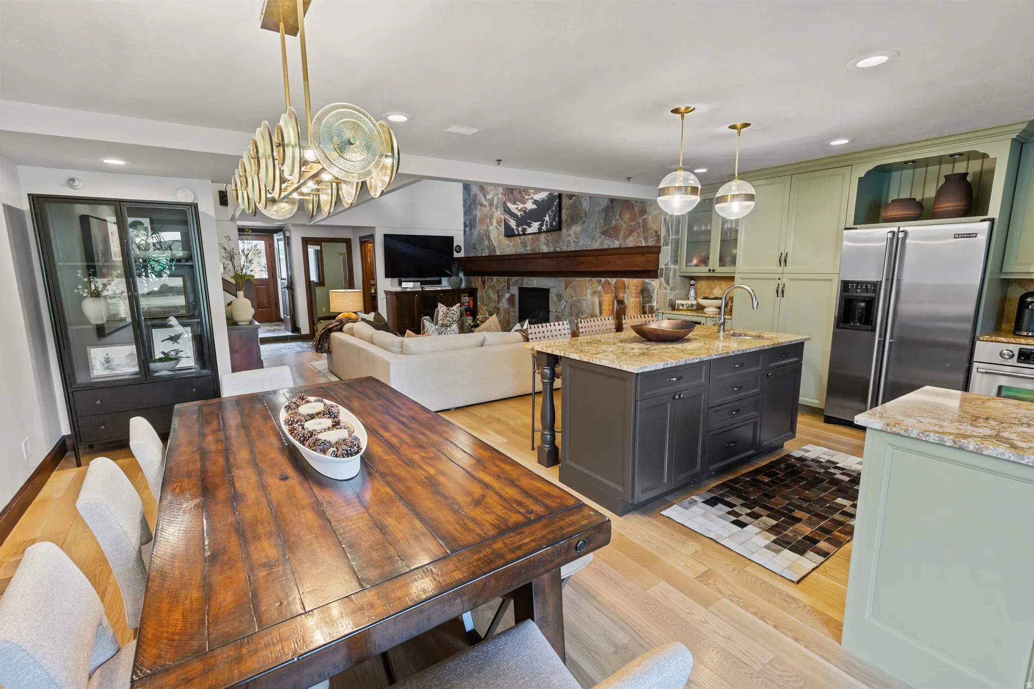 Open-concept living space featuring light wood-finish flooring