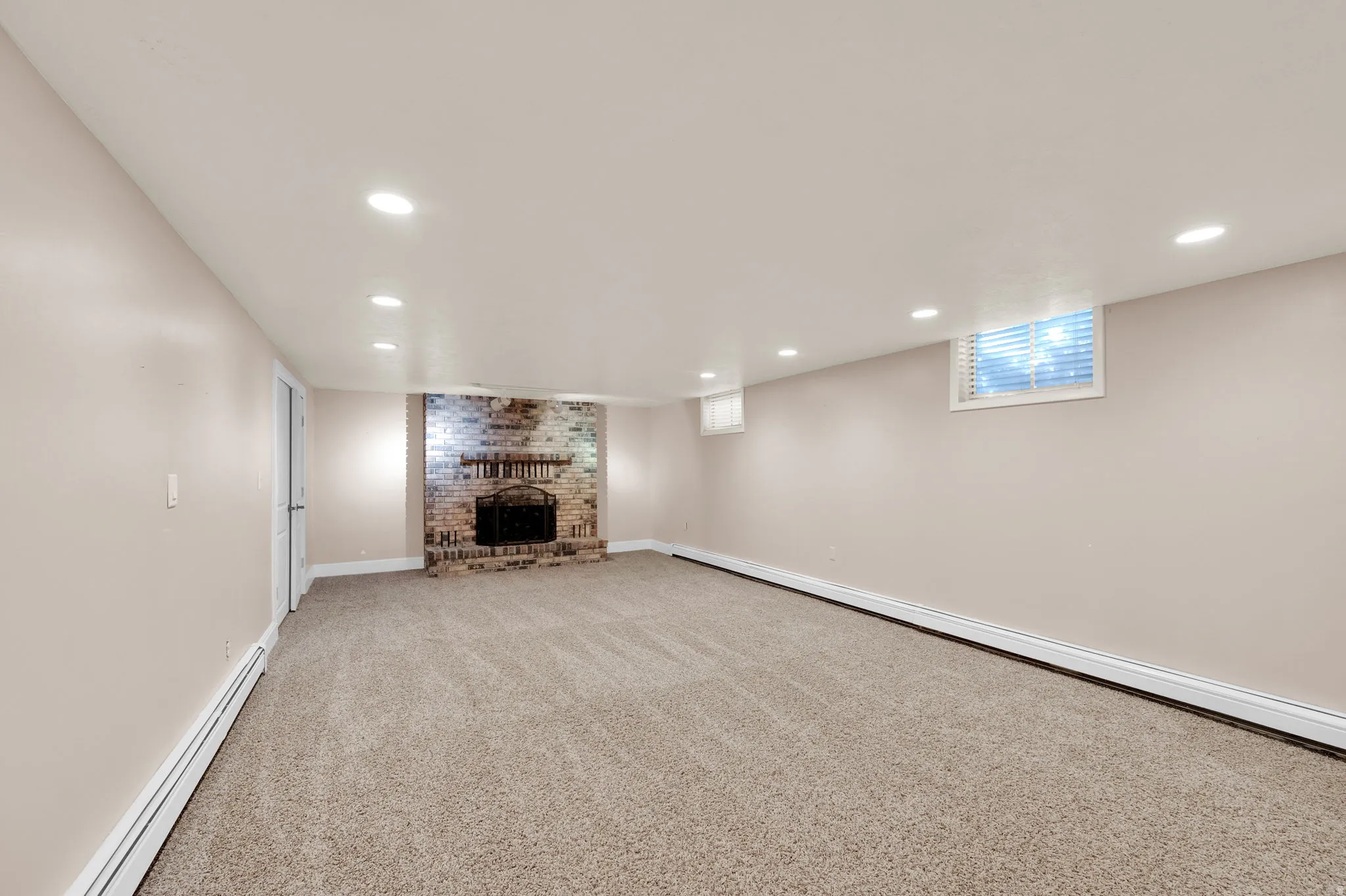 Basement family room with wood fireplaces