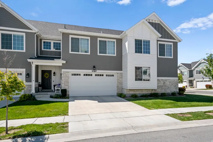 Modern and charming townhome with 2 car garage
