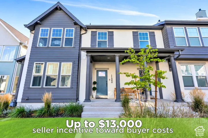 With modern curb appeal, featuring a welcoming covered porch that invites you inside.