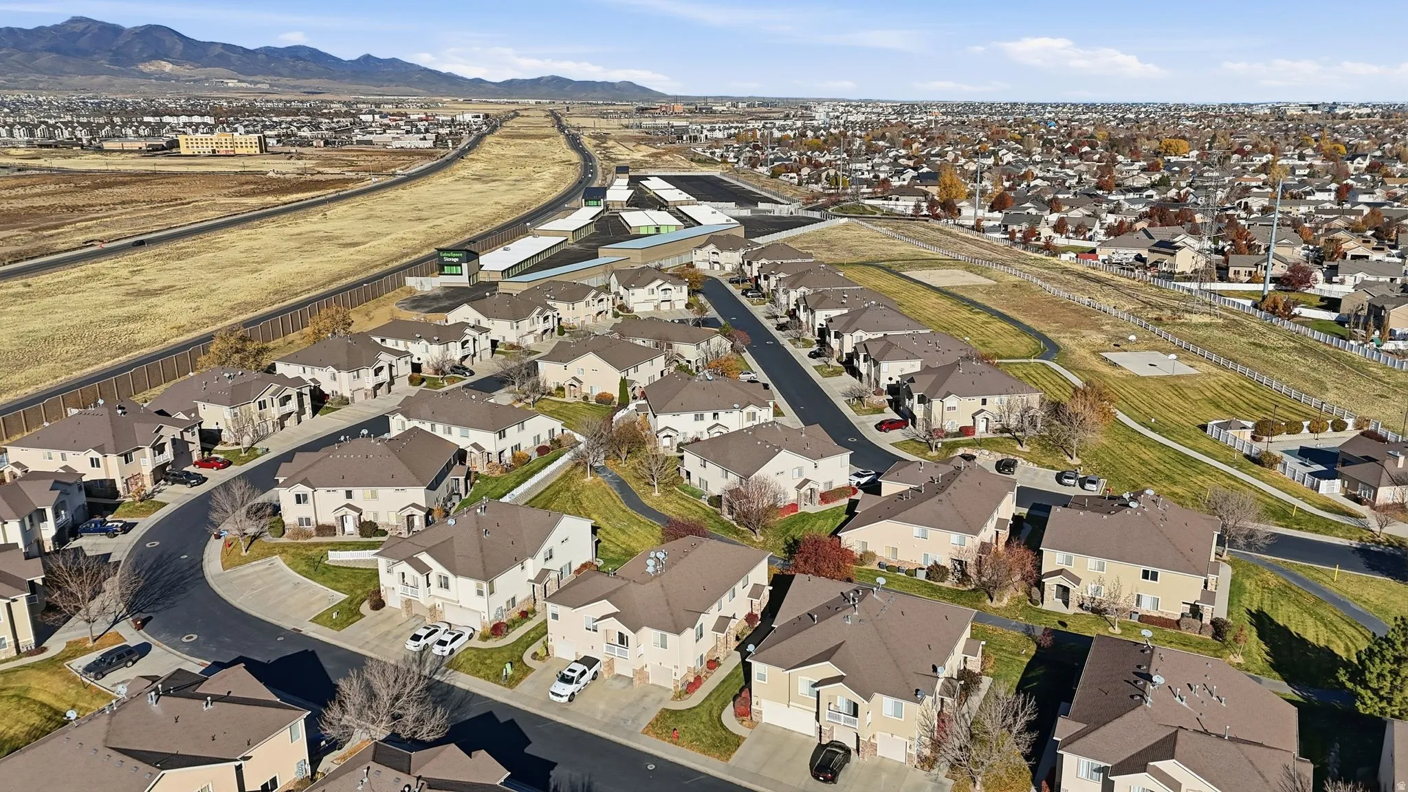 Aerial perspective showcasing a residential community with uniform architectural styles