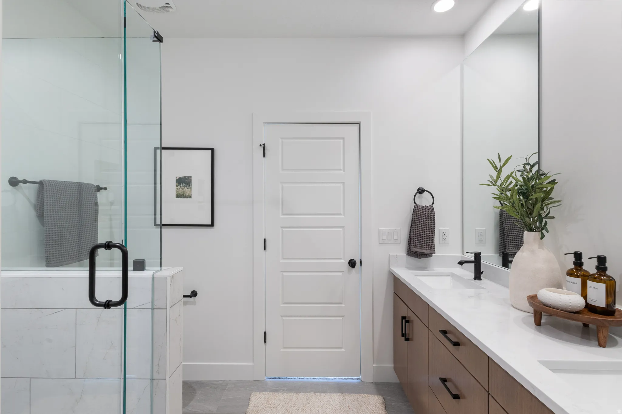 Photos of previous Model: Primary bathroom, featuring double vanity, and full euro shower