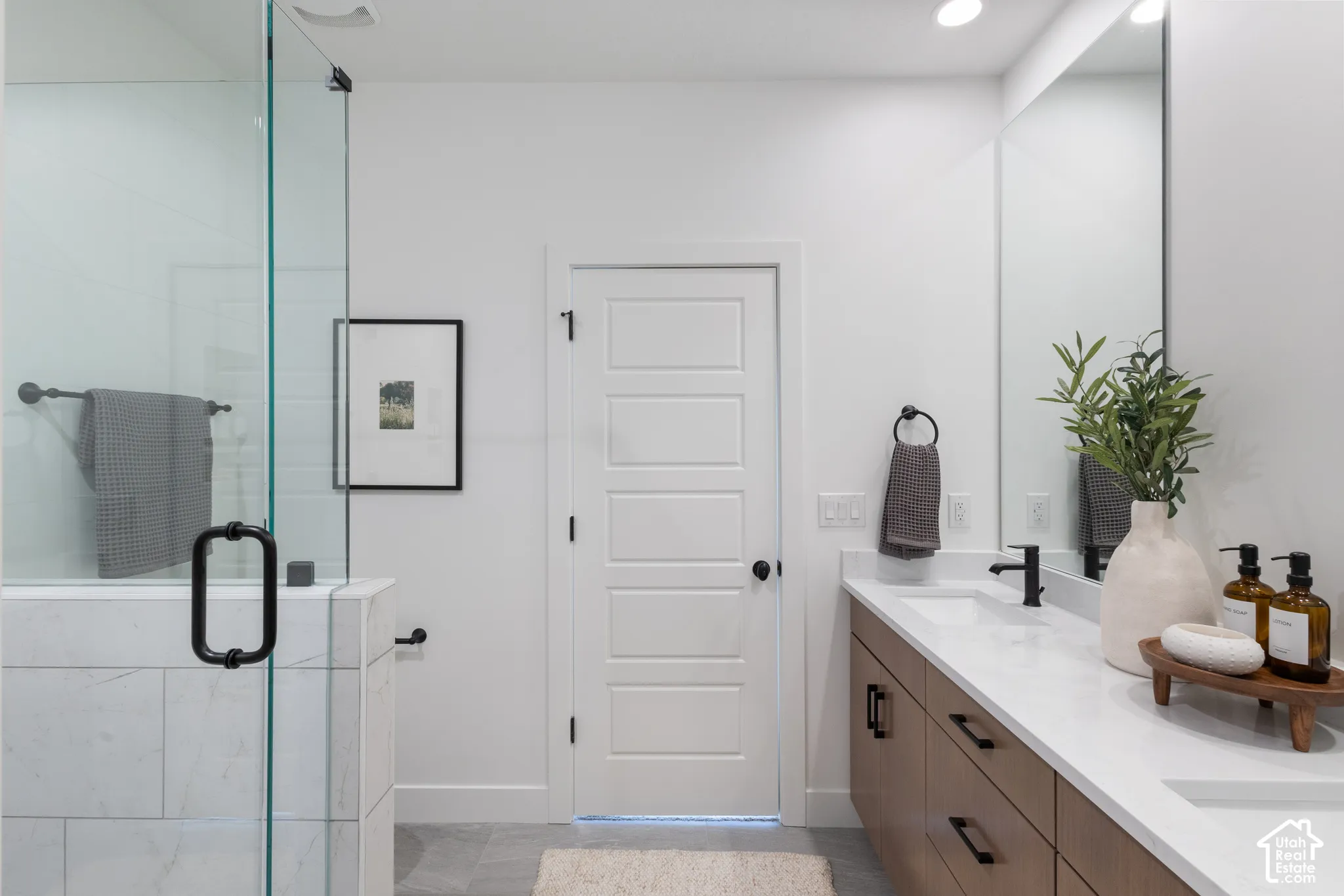 Photos of previous Model: Primary bathroom, featuring double vanity, and full euro shower
