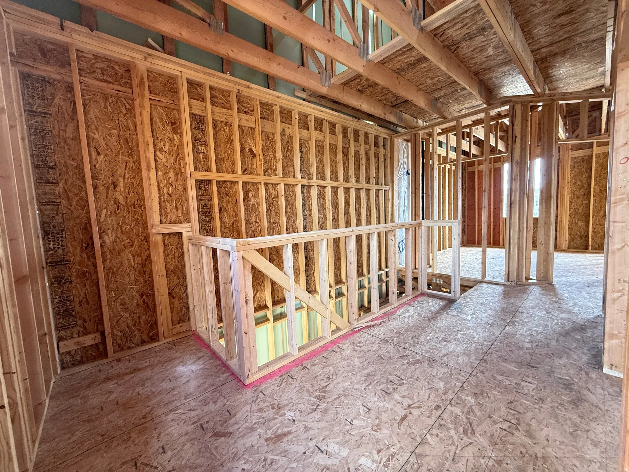 Loft area featuring open concept