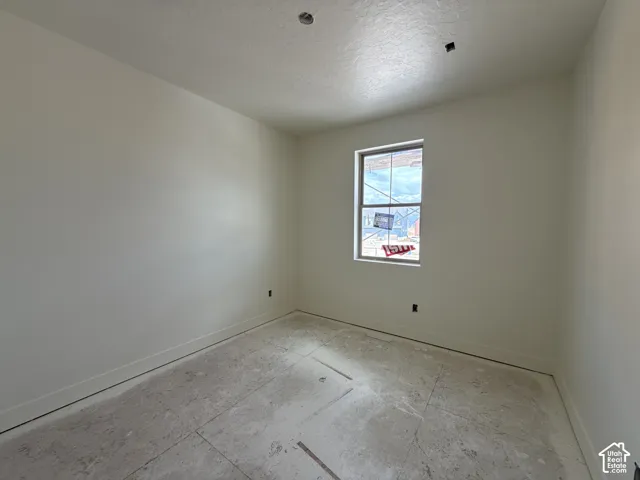 Neutral wall color with a single window