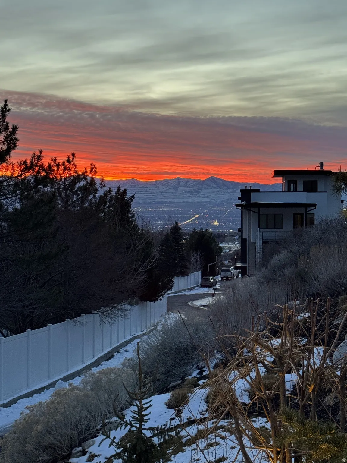 Modern architectural residence with mountain backdrop