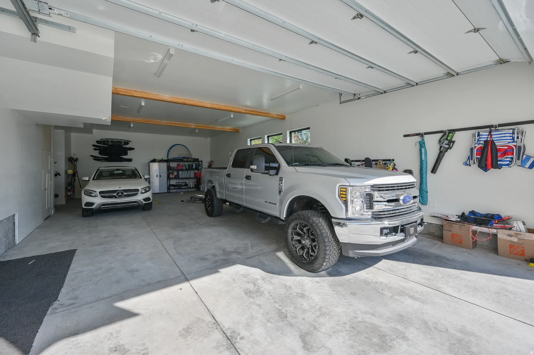 Spacious garage with light-colored concrete flooring