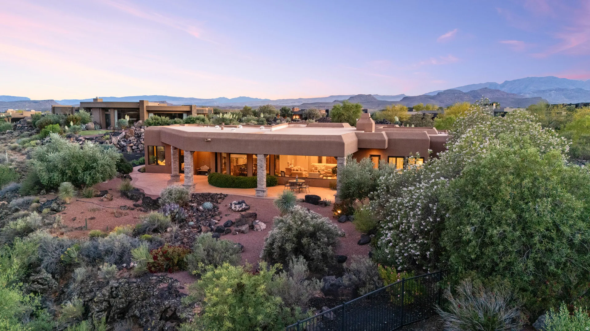 Southwestern style architecture featuring a stucco exterior and flat roofline