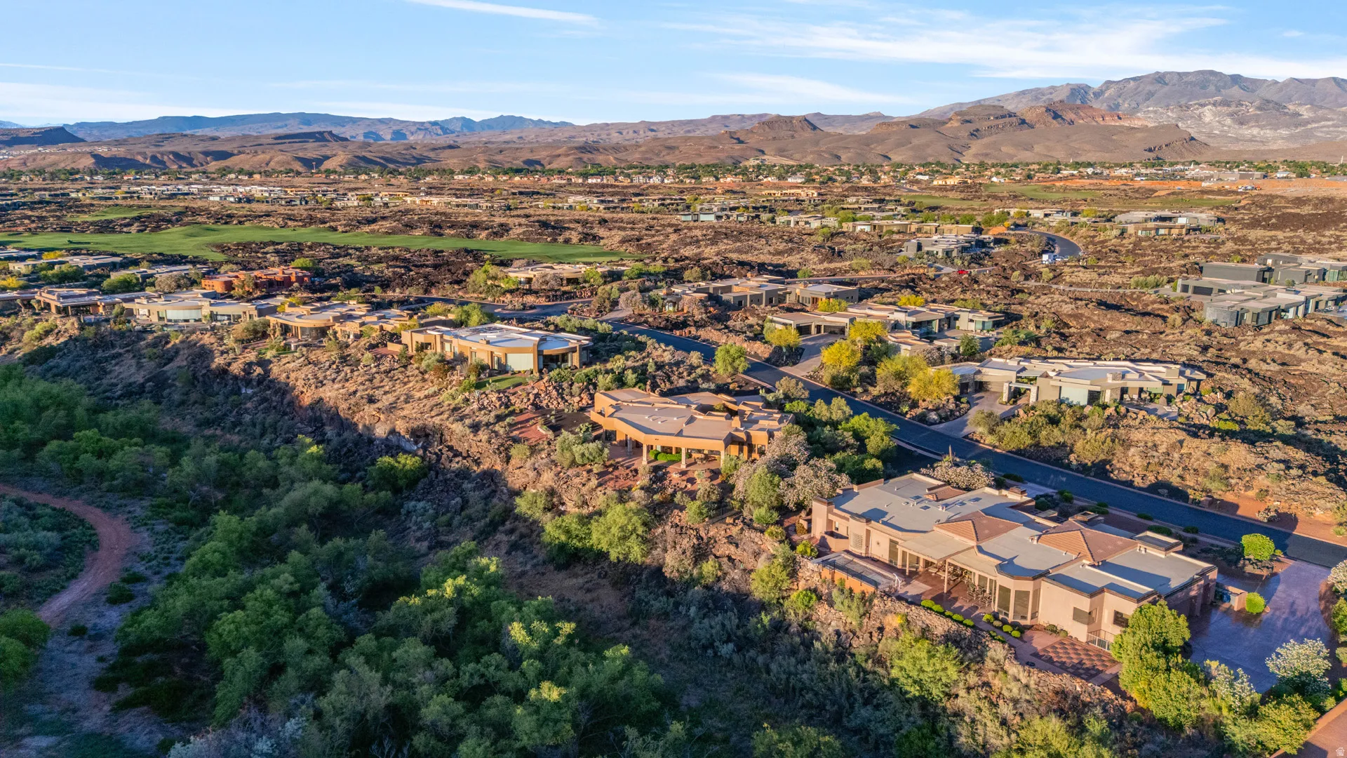 Terraced homesites with a backdrop of distant mountains