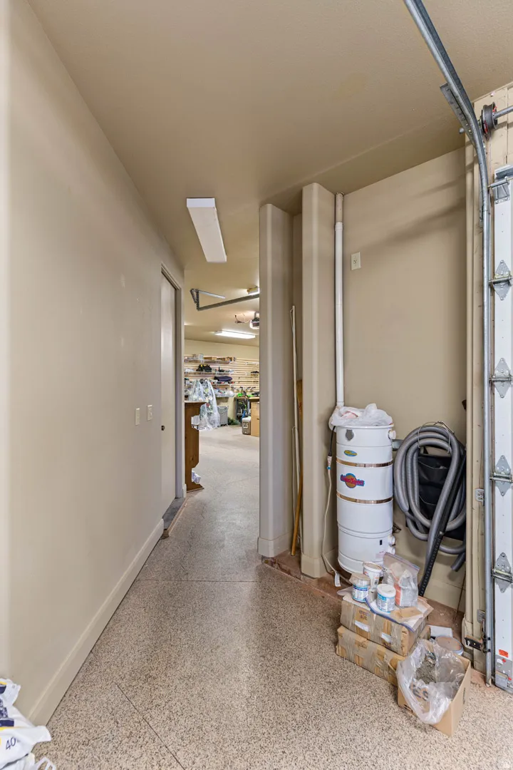 Walkway between garages and also access to flex room.