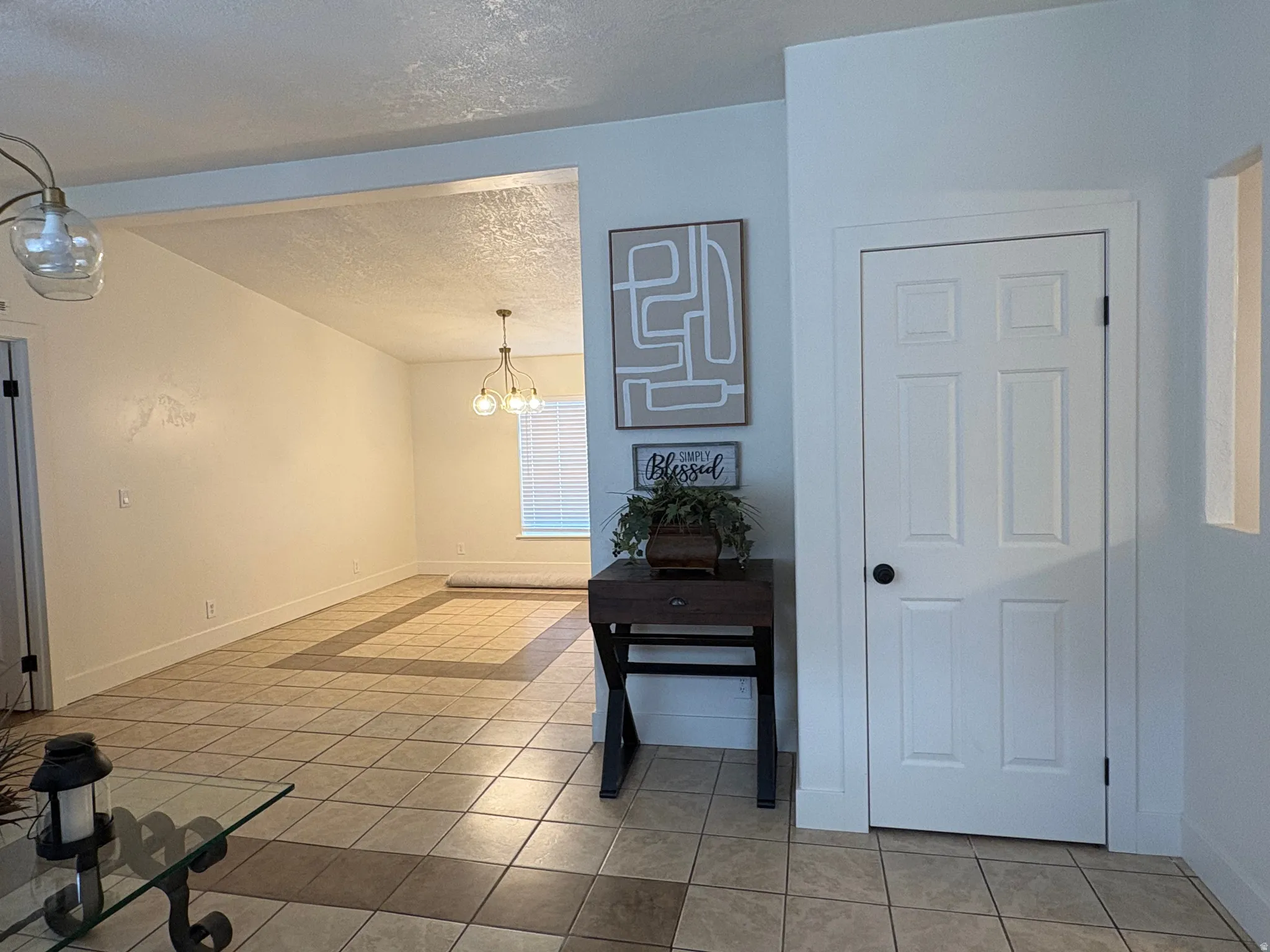 Tiled flooring with contrasting border detail throughout