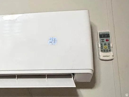 Wall-mounted cooling unit with digital display and remote control