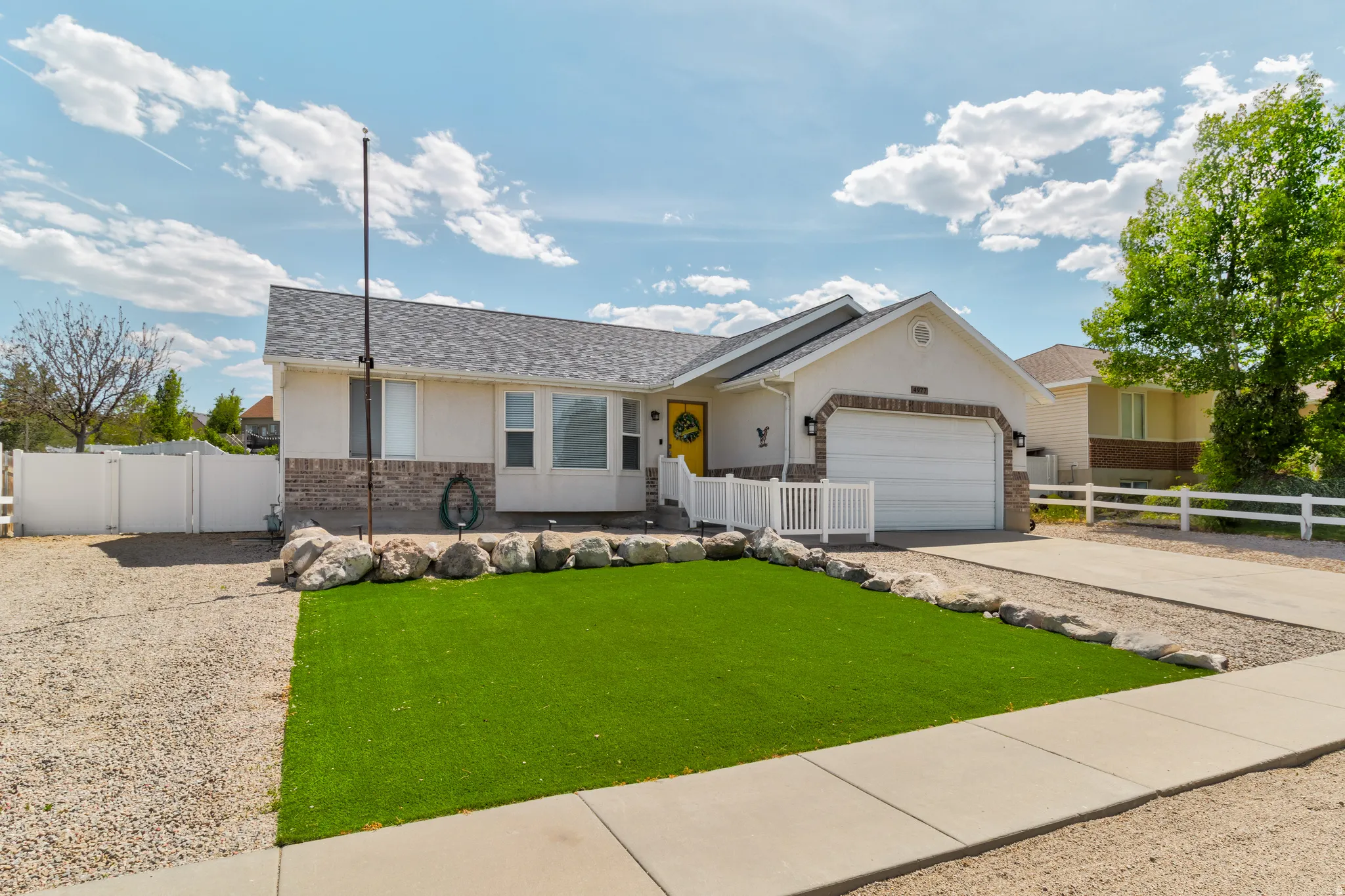 Ranch-style exterior with RV Parking, a partial brick facade and light-colored siding