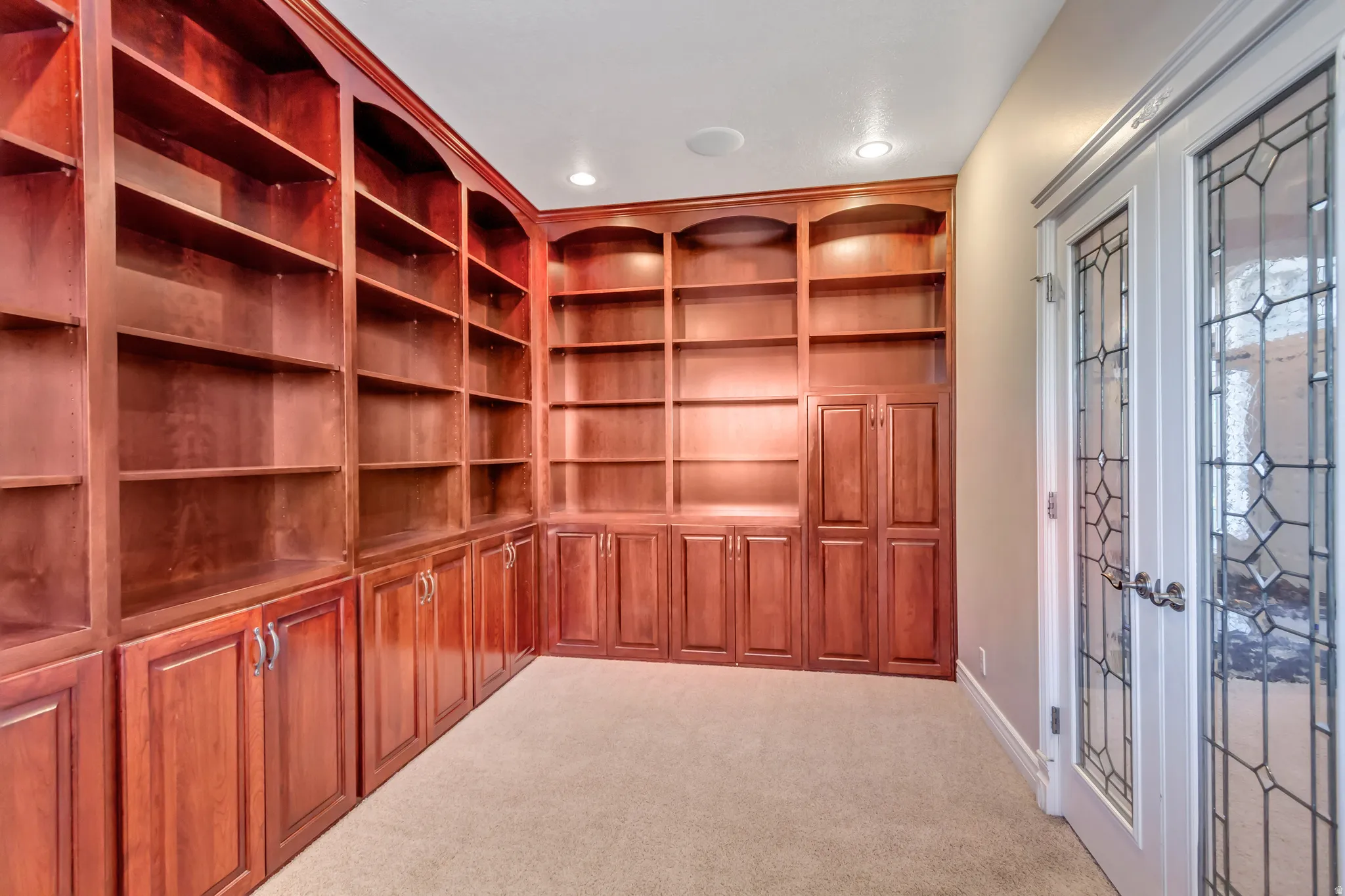 Built-in wood-finish shelving and cabinetry