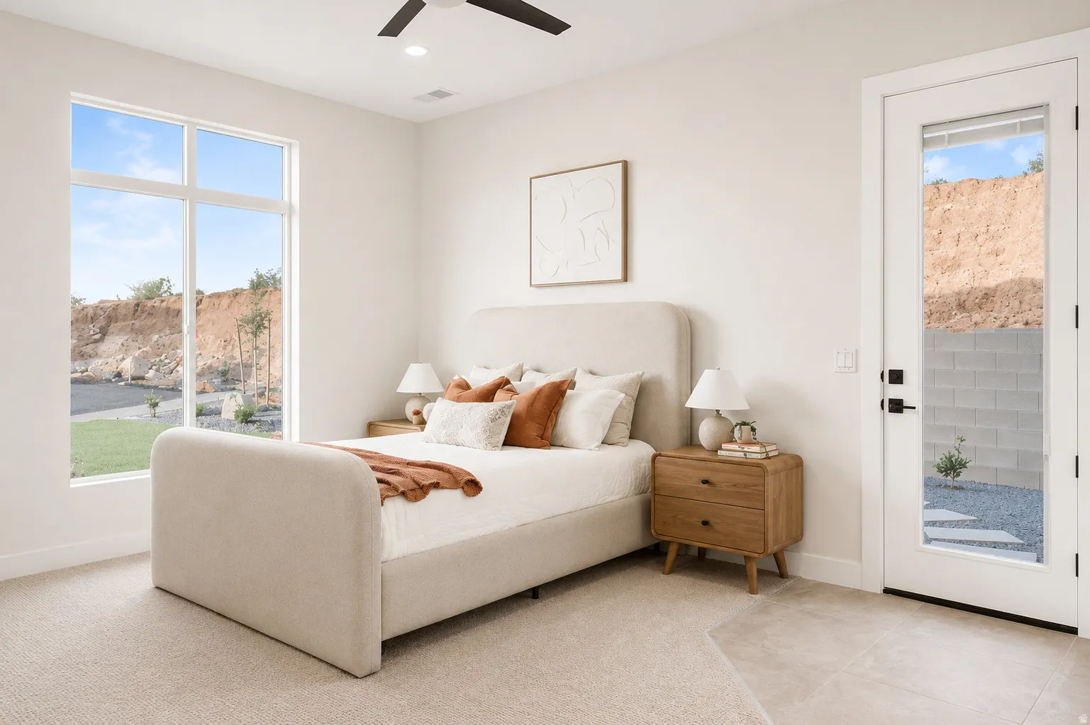 Room featuring a large picture window, a glass-paneled exterior door, a ceiling fan, recessed lighting, and a combination of carpet and tile flooring