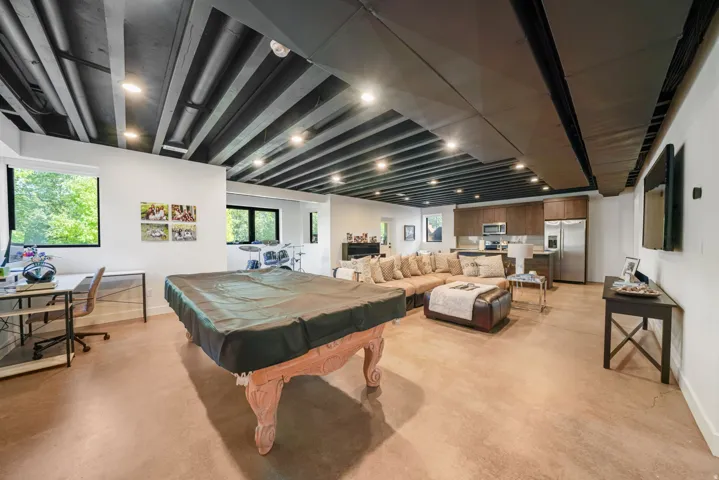 Exposed beam ceiling with recessed lighting