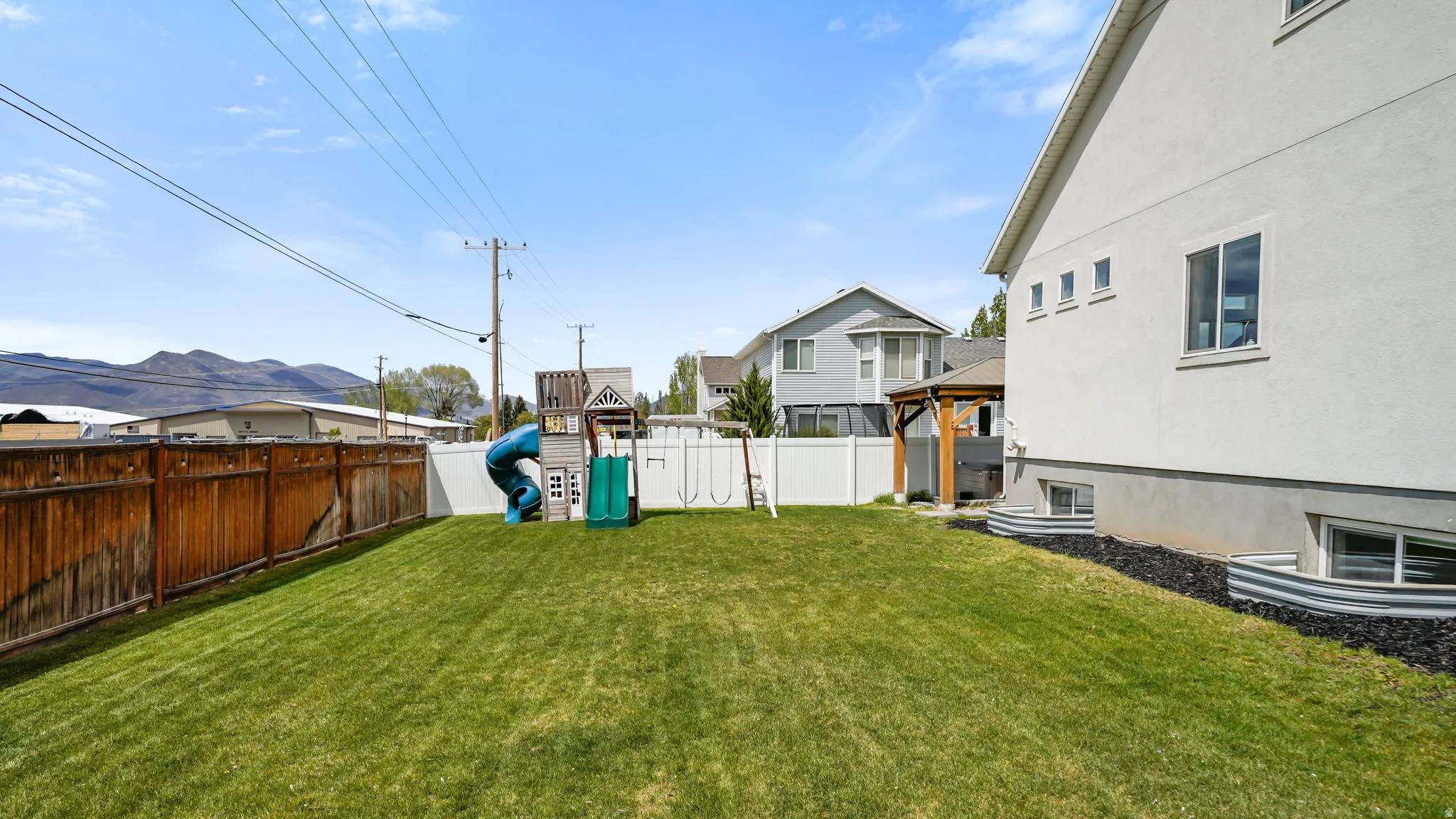 Side yard, West side of home, looking North