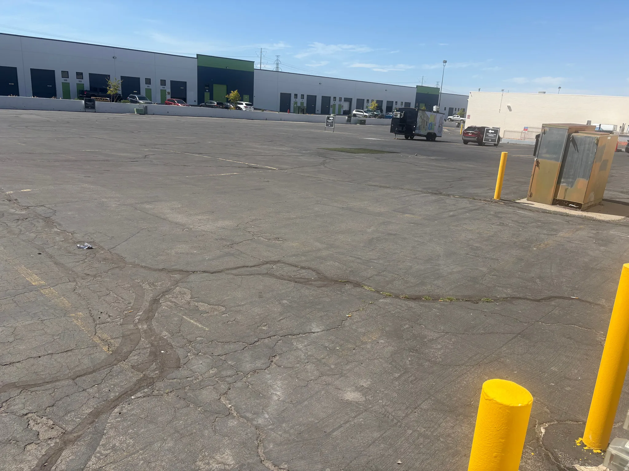Expansive paved lot offering substantial vehicle accommodation