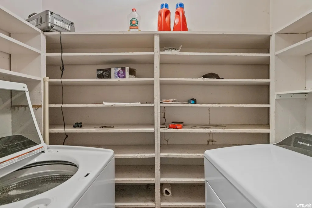 Laundry room featuring washer / clothes dryer