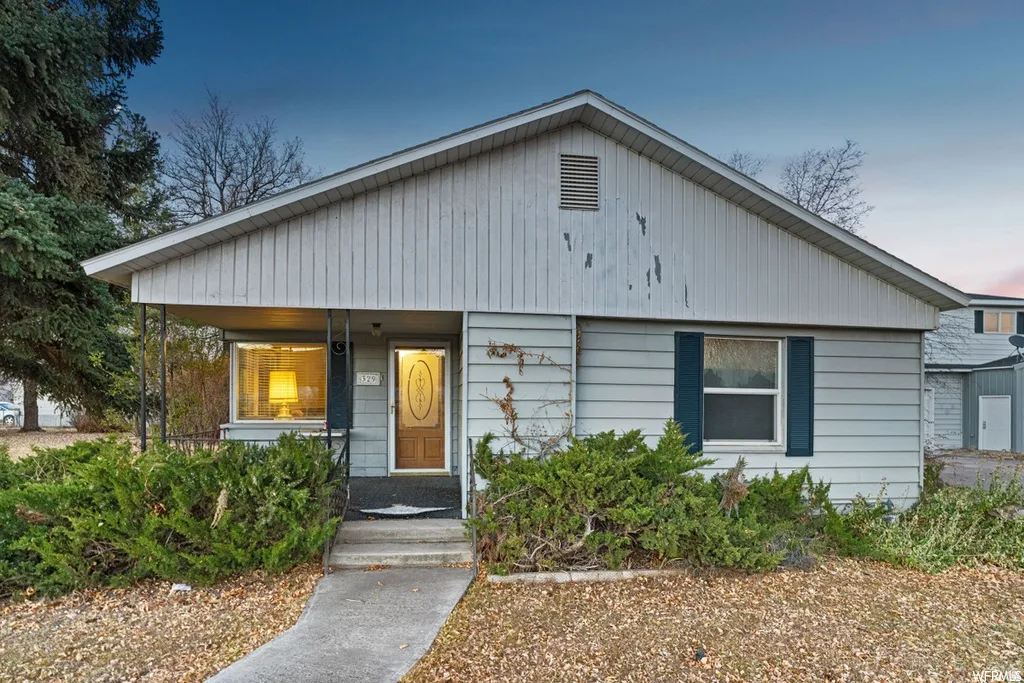 View of front of house with covered porch