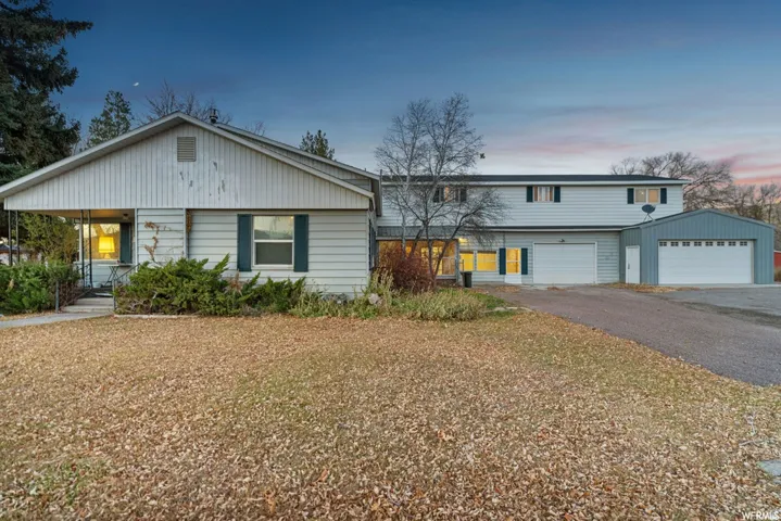 View of front of home featuring driveway