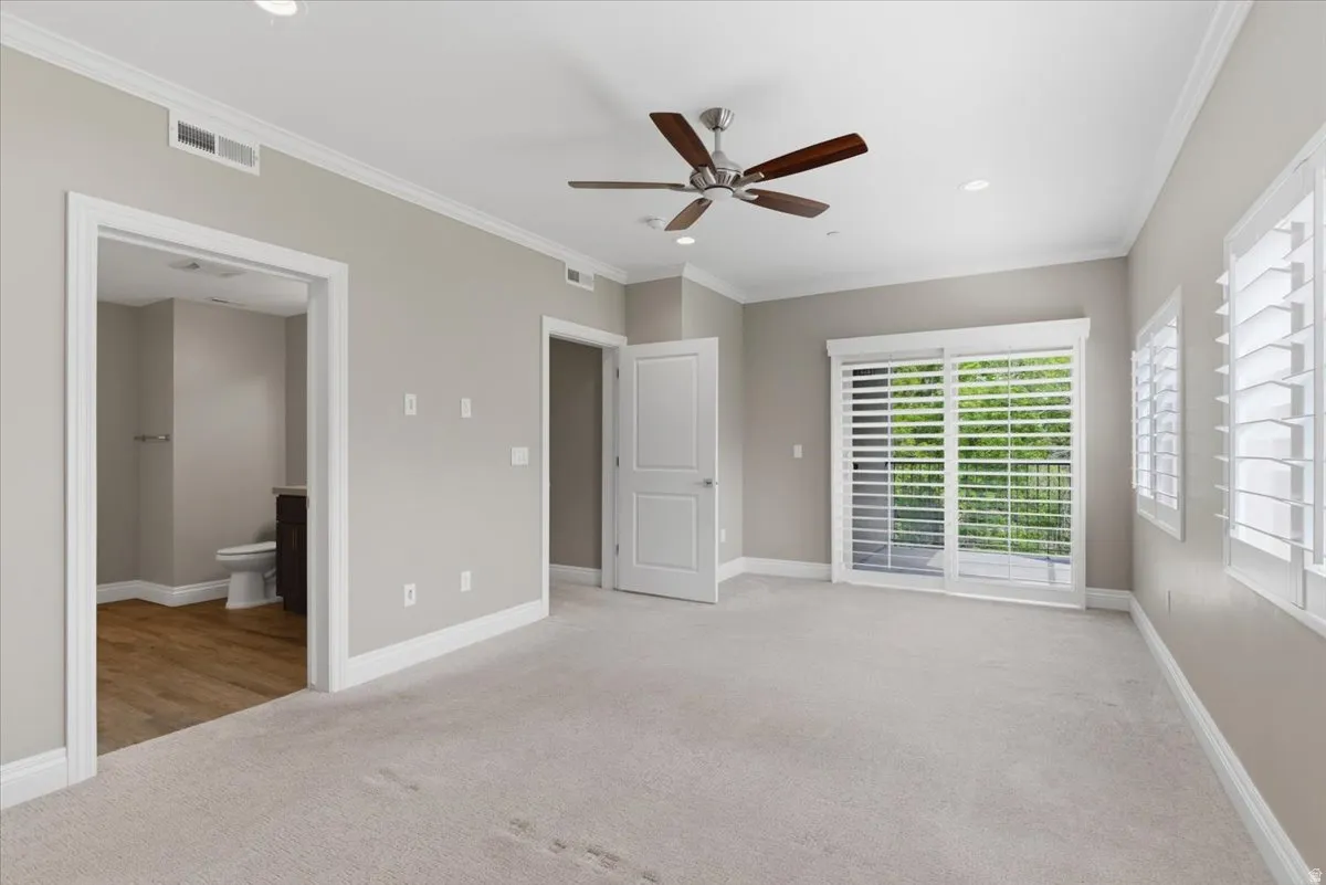 Primary Bedroom with View to Private Balcony