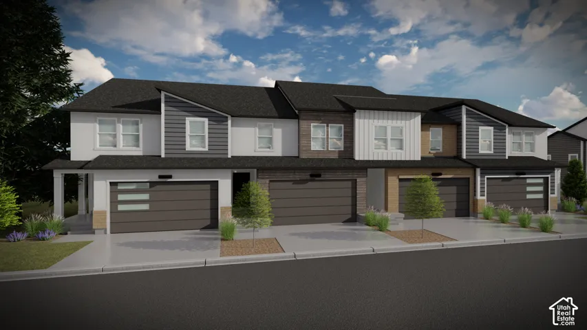 Contemporary multi-unit residence with varied façade treatments including horizontal and vertical siding
