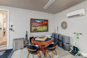 Recessed ceiling light with a ceiling-mounted fan and a wall-mounted mini-split system