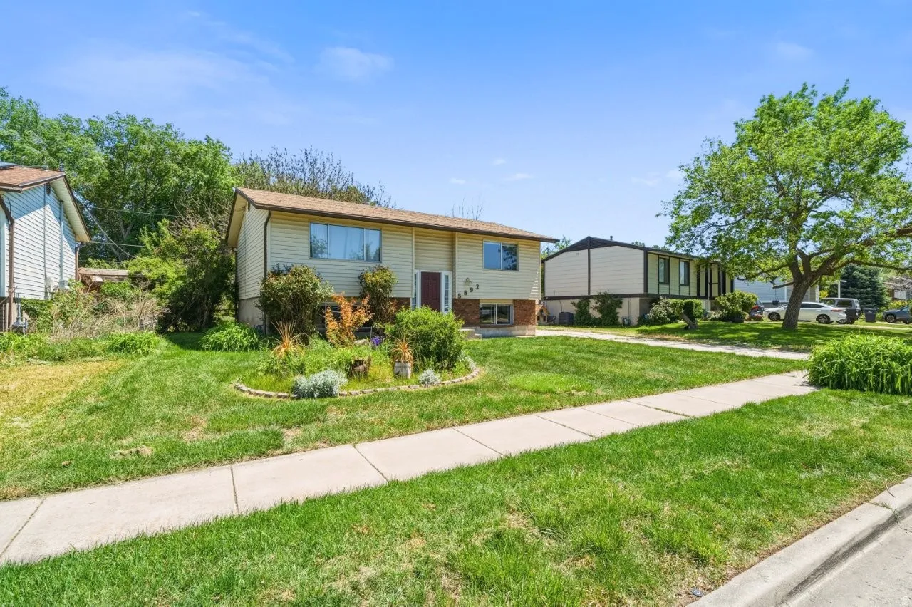 Tucked into a mature, tree-lined neighborhood in Roy, this home offers a large front yard and solid construction. With some personal touches and updates, this property has serious potential to shine.