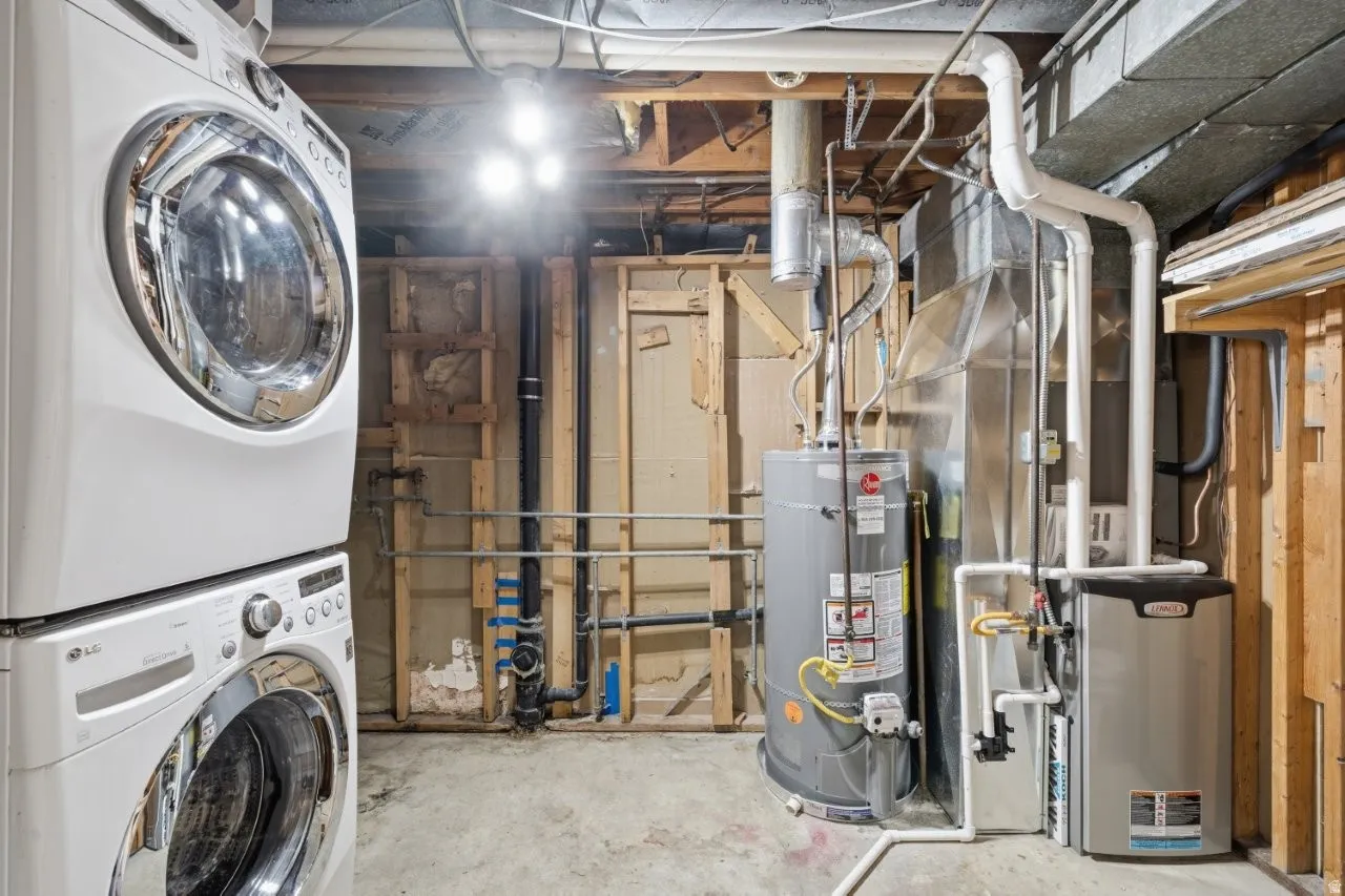 Stacked LG front-load washer and dryer are included and ready to go. Rheem water heater and Lennox furnace round out the mechanical package, giving buyers confidence in the major systems. Everything is right here and accessible.