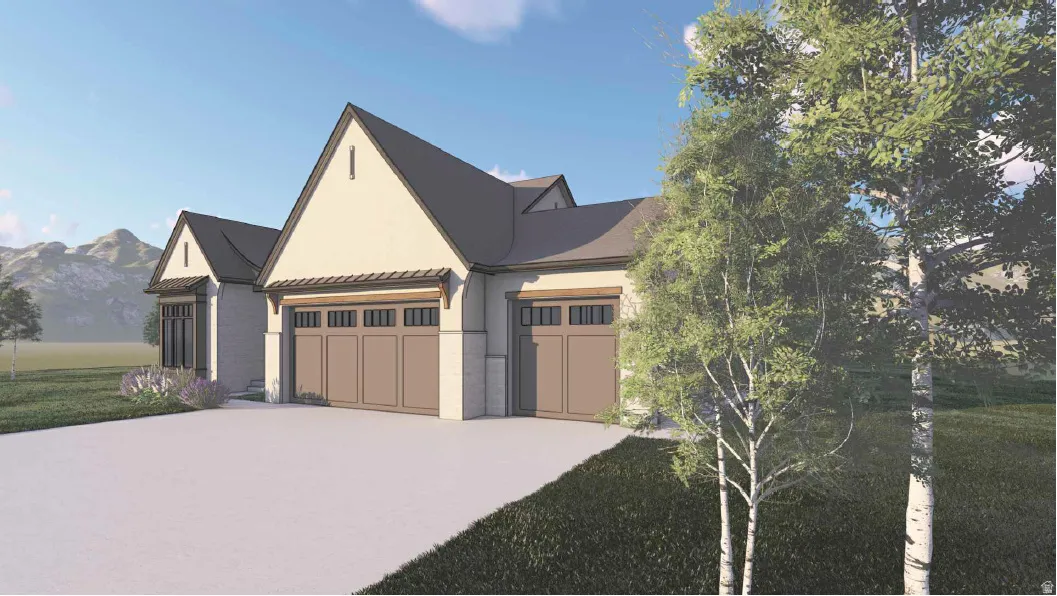View of front of home with stucco siding, a garage, driveway, and a mountain view