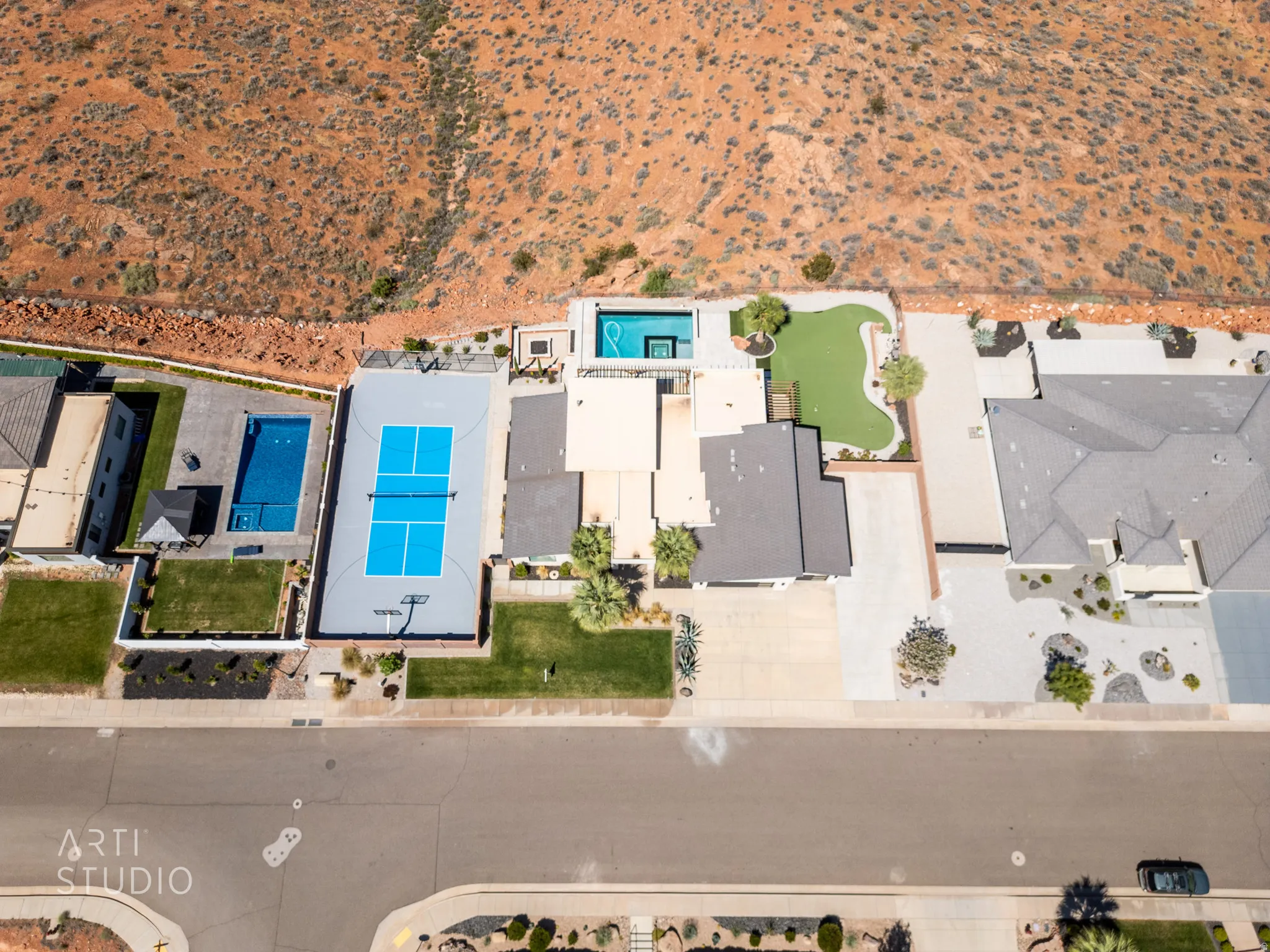 Expansive property featuring a basketball court, putting green, and a swimming pool