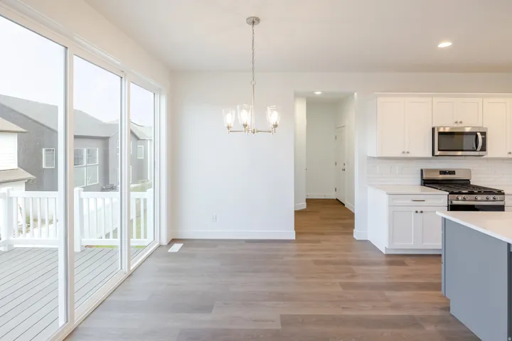 Sliding glass doors opening to an outdoor deck