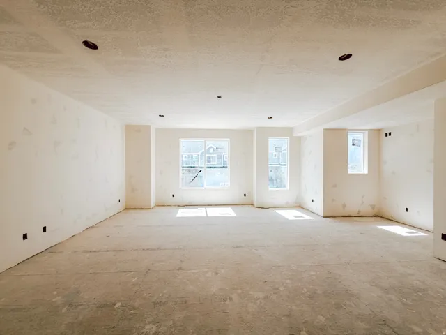 Recessed lighting, multiple windows, and a level subfloor