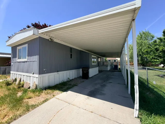 Long carport providing covered parking