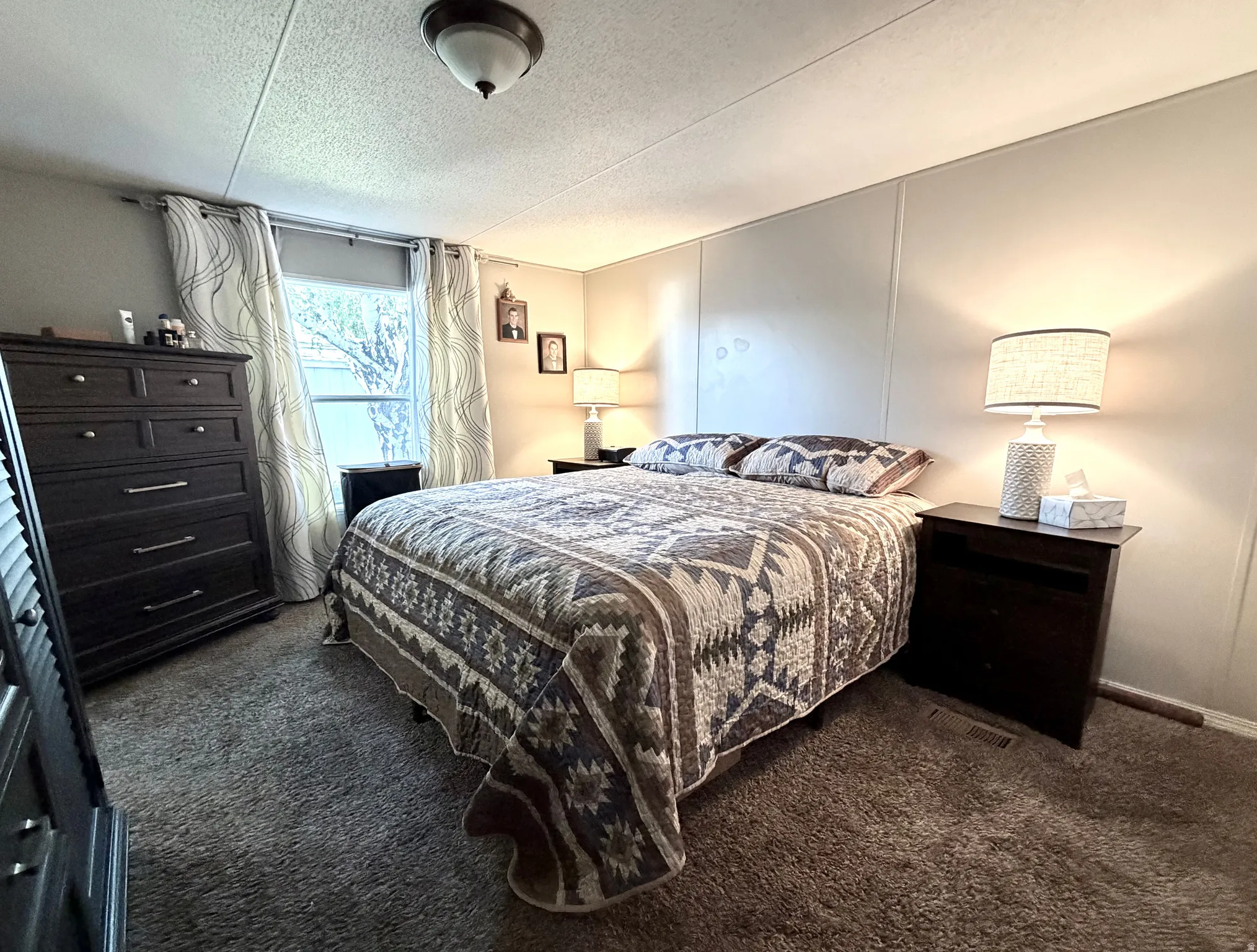 Primary bedroom fits king-sized bed