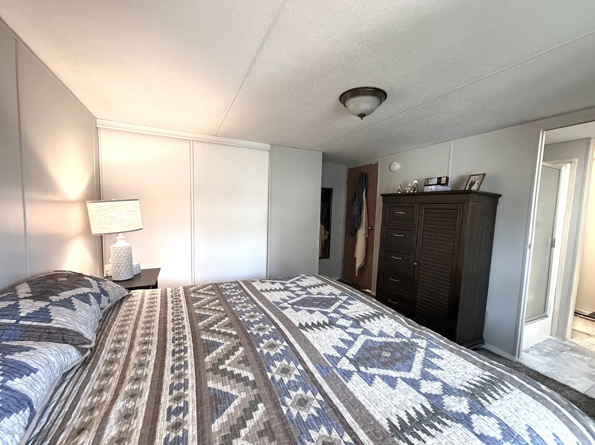 Primary bedroom fits king-sized bed
