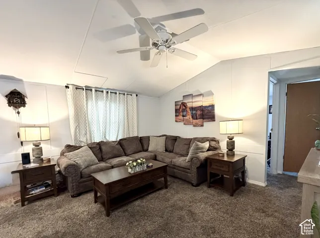 Spacious, open living area featuring vaulted ceilings